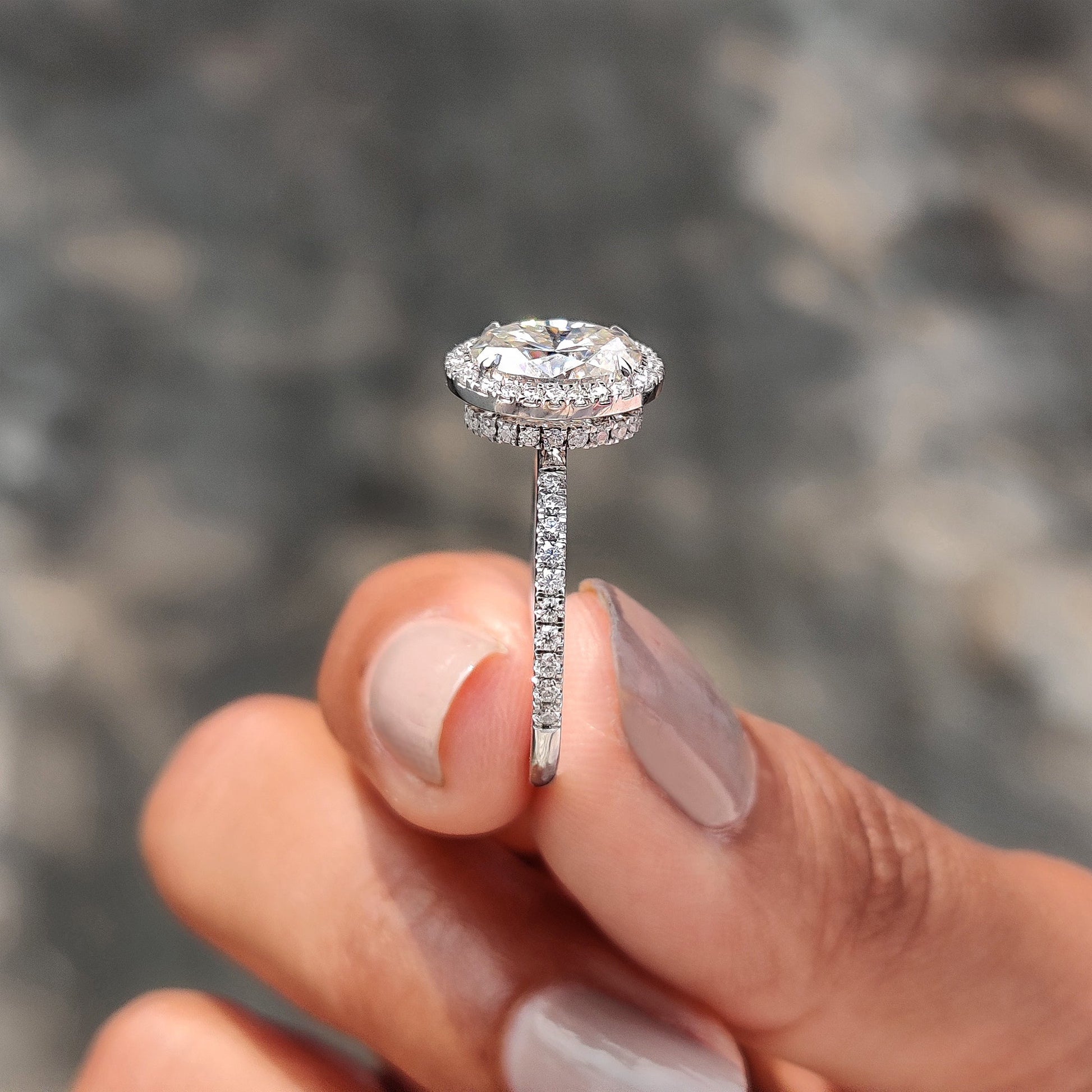 Oval Cut Hidden Halo Engagement Ring In White Gold