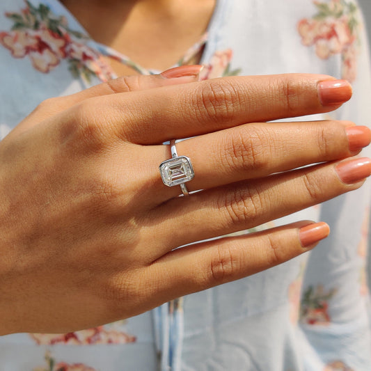 Emerald Engagement Ring With Bezel Setting