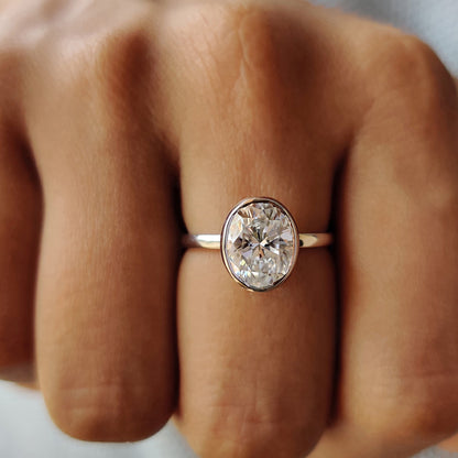 Oval Bezel Engagement Ring In White Gold