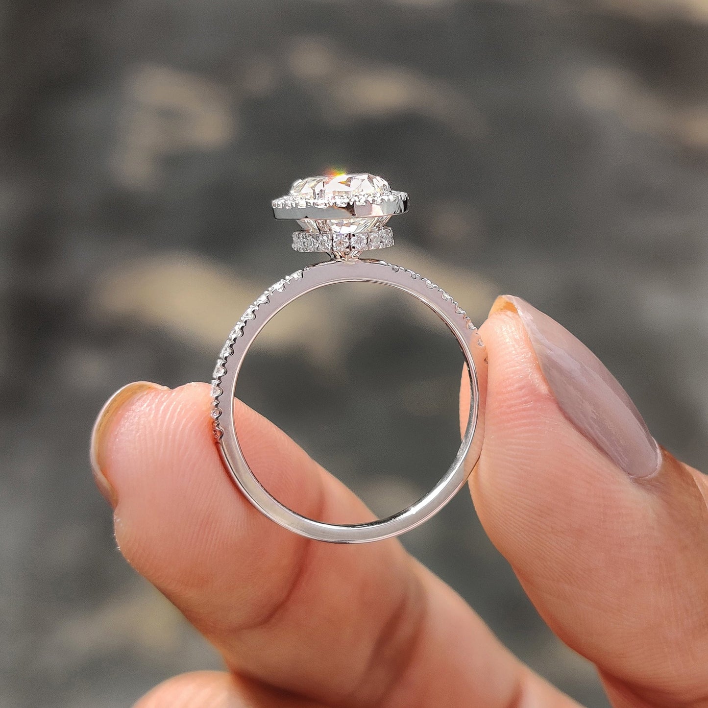 Oval Cut Hidden Halo Engagement Ring In White Gold
