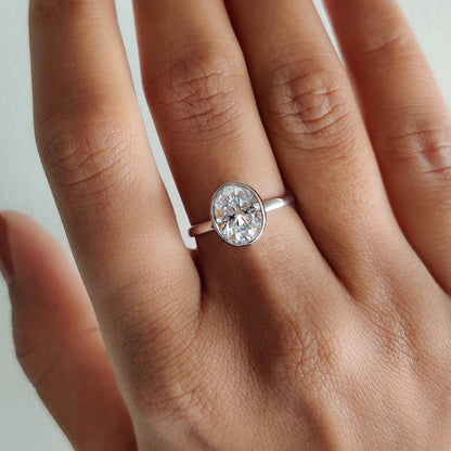 Oval Bezel Engagement Ring In White Gold