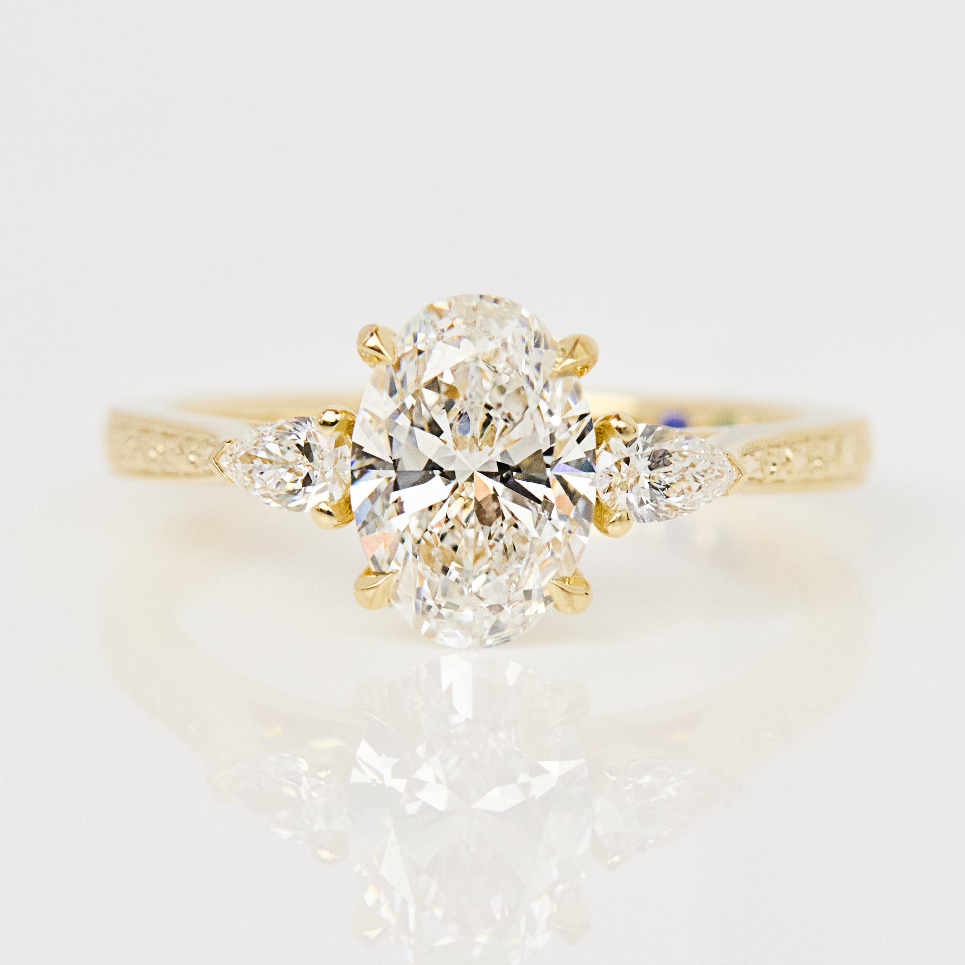 Marquise Shaped Three Stone Lab Grown Diamond Engagement Ring