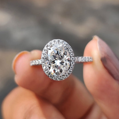 Oval Cut Hidden Halo Engagement Ring In White Gold