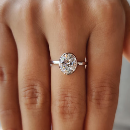 Oval Bezel Engagement Ring In White Gold