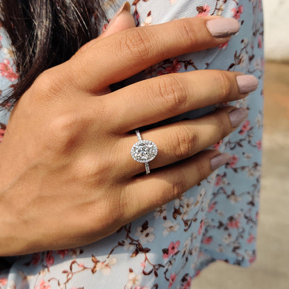 Oval Cut Hidden Halo Engagement Ring In White Gold