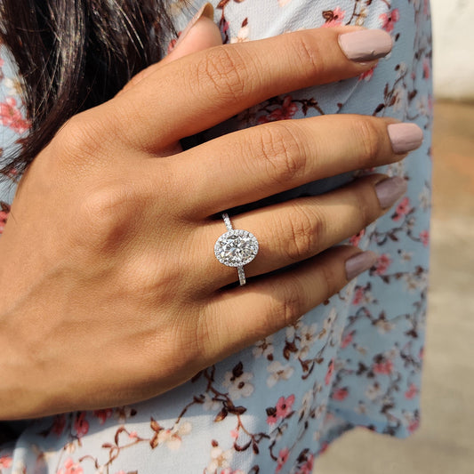Oval Cut Hidden Halo Engagement Ring In White Gold